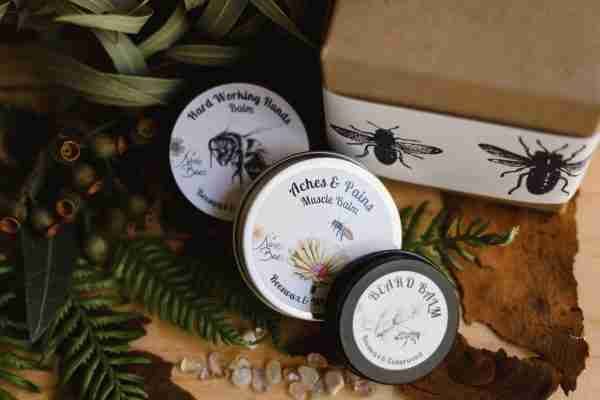 Men’s gift pack from Nina’s Bees with muscle balm, hand balm, and beard balm in eco-friendly packaging"