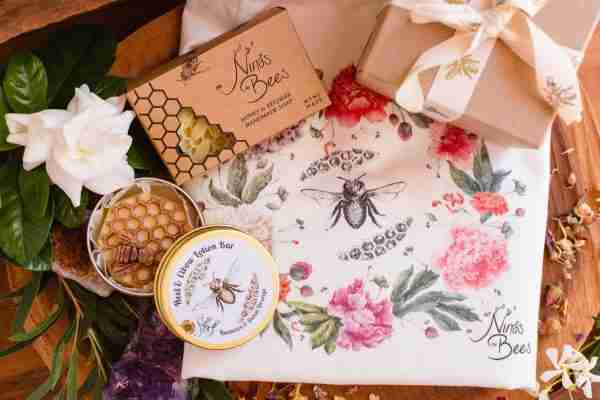 Versatile Gift Box from Nina’s Bees – includes a canvas tote bag, honey and beeswax soap, natural lip balm, and choice of skincare
